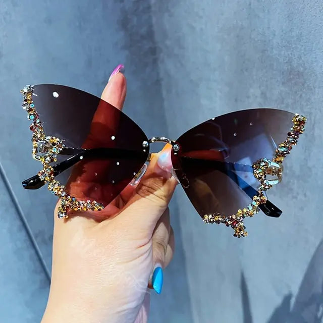 Gafas de sol con forma de mariposa y diamantes