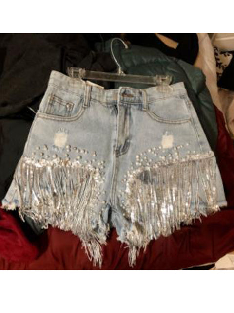 Short en jean avec perles et pompons