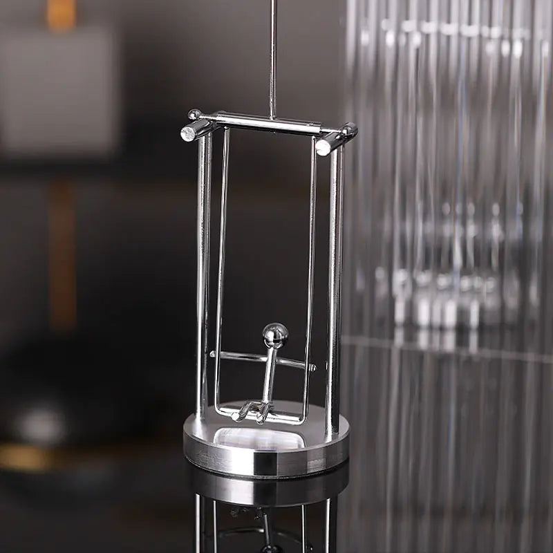 Jouet de bureau d'équilibre Kinetic Swing