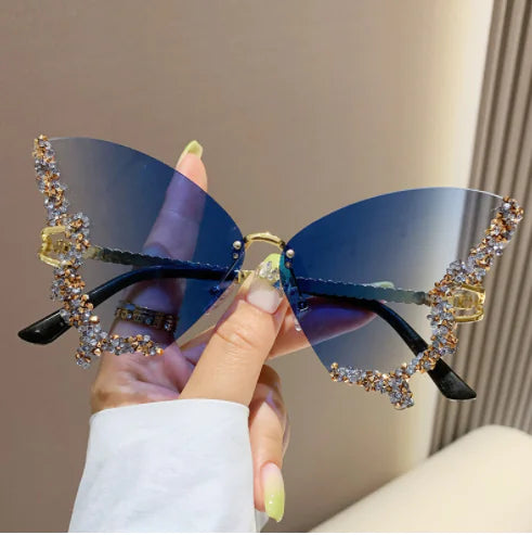 Gafas de sol con forma de mariposa y diamantes