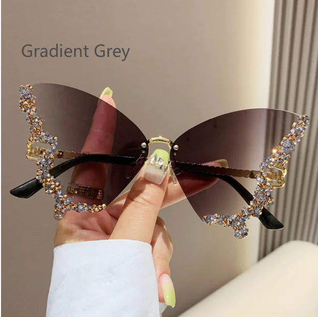 Gafas de sol con forma de mariposa y diamantes