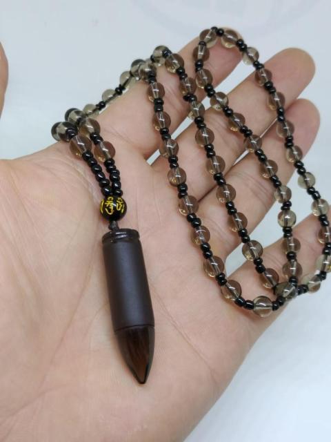 Collier pendentif en obsidienne-balle